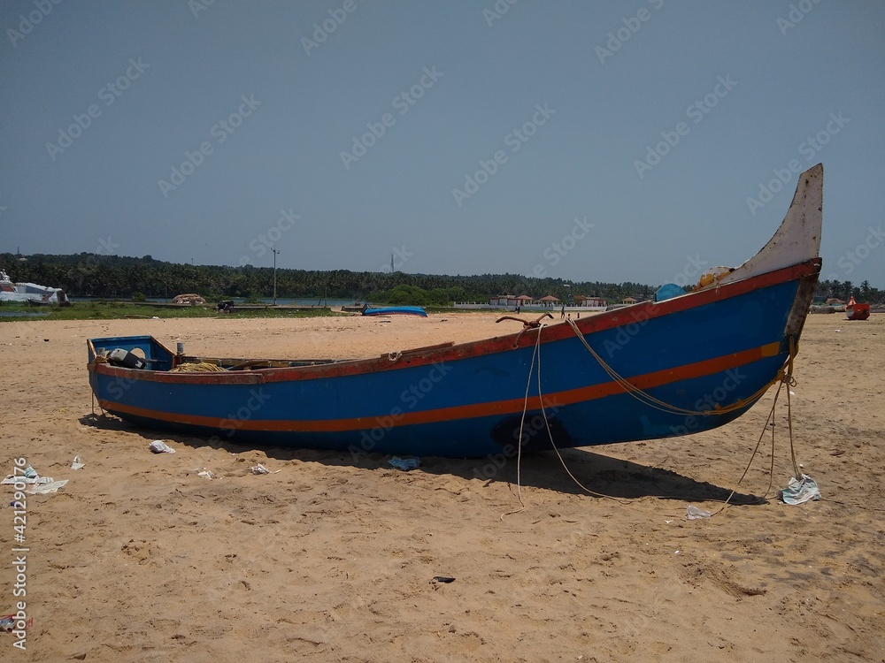 Fishing boat on the beach, Pozhiyoor Thiruvananthapuram Kerala Fishing boat on the beach, Pozhiyoor Thiruvananthapuram Kerala