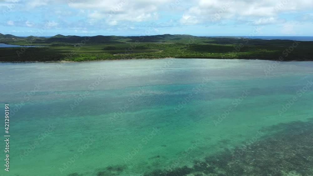 Aerial tracking view of northern point of New Caledonia known as Boat Pass. Aerial tracking view of northern point of New Caledonia known as Boat Pass.