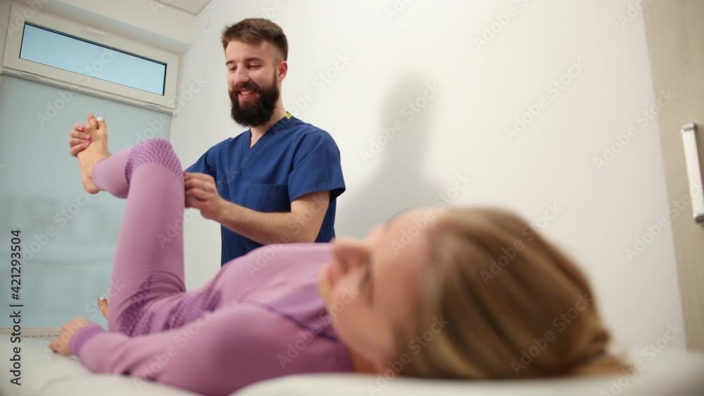 Manual therapist physician. Sports massage. Working with patient, massaging Manual therapist physician. Sports massage. Working with patient, massaging
