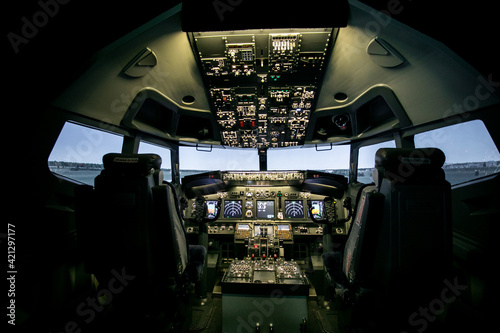 view from the cockpit to the runway photo