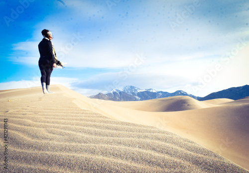 person walking on the sand