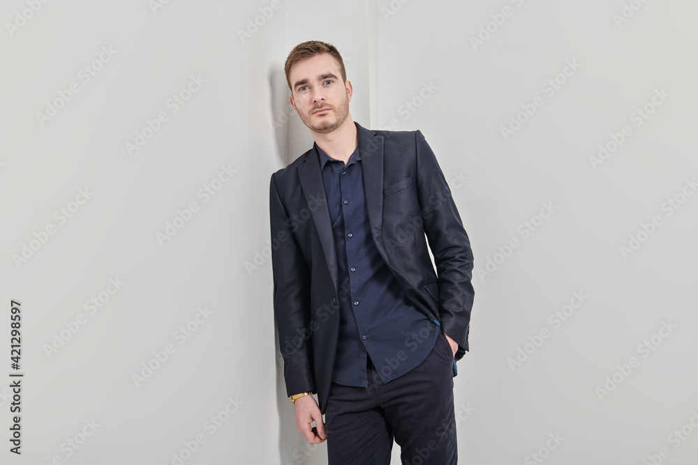 pensive man in dark blue suit pensive man in dark blue suit