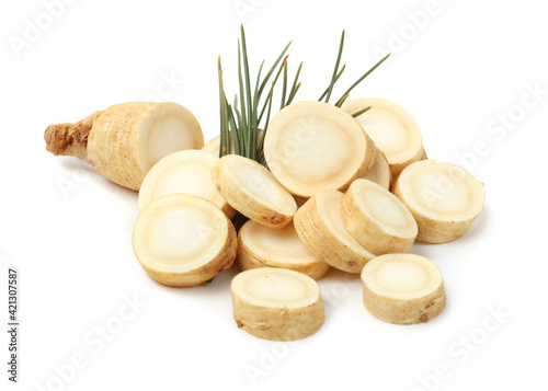 Plakat fresh ginseng root slices on white background