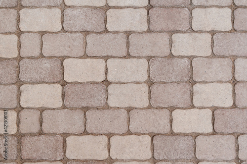 The pavement is made of complex paving stones.