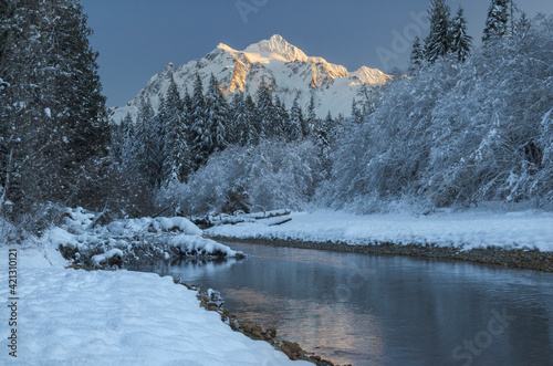 USA, Washington State. Mount Shuksan seen from the Nooksack River valley in winter, North Cascades. photo