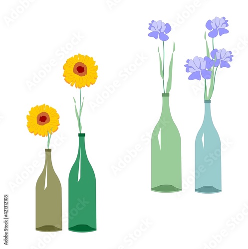 Spring bright floral arrangement in glass bottles.