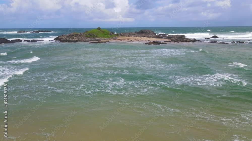 Headland And Rocky Outcrops With Scenery Of Foamy Waves Splashing At Sawtell Beach In New South Wales, Australia. - Aerial Drone Shot Headland And Rocky Outcrops With Scenery Of Foamy Waves Splashing At Sawtell Beach In New South Wales, Australia. - Aerial Drone Shot
