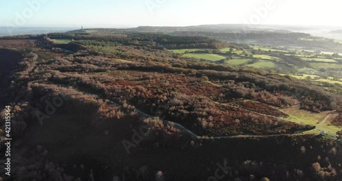 Aerial rising early morning shot looking over Culmstock Beacon Blackdown Hills Devon England UK photo