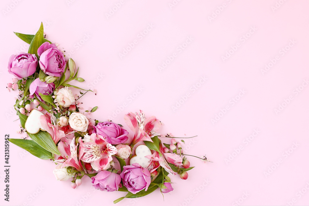 Floral frame on pink background.