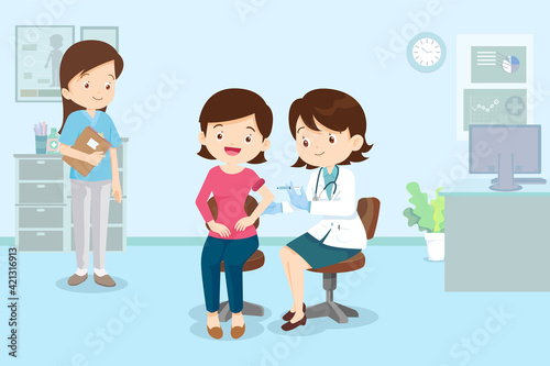 doctor injection vaccine for woman in hospital