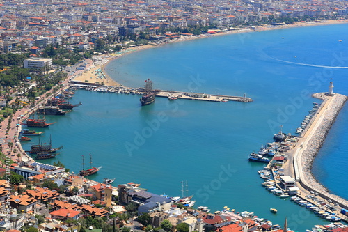 Mediterranean. View of Alanya harbor in southern coast of Turkey. Landscape with marina and Kizil Kule tower. Amazing place for summer vacation.
