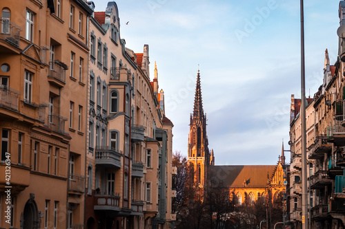 view of the beautiful evening street of wroclaw with a tower in poland
