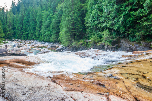 Majestic mountain river with mountain background in Vancouver, Canada.