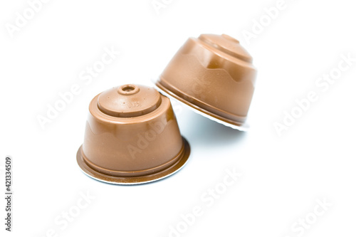 Coffee capsule for coffee machine isolated on white background