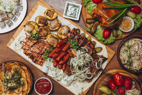 Εκτύπωση καμβά delicious European and Slavic cuisine on the big table waiting for guests