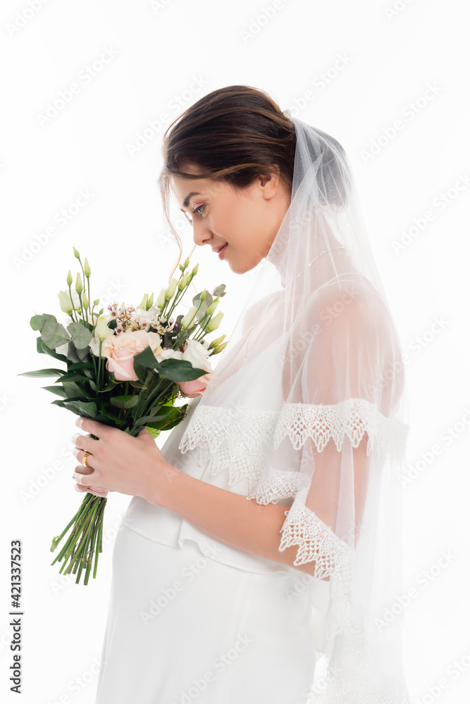 side view of pregnant bride holding wedding bouquet isolated on white side view of pregnant bride holding wedding bouquet isolated on white