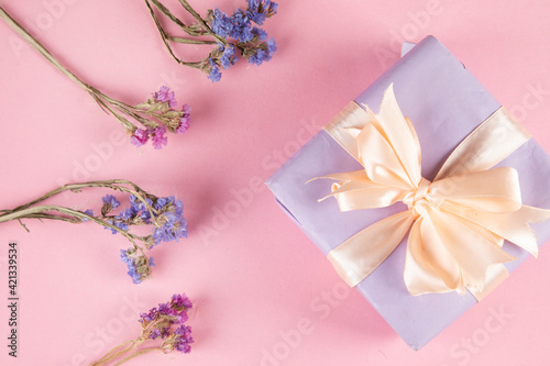 gift box with purple flower