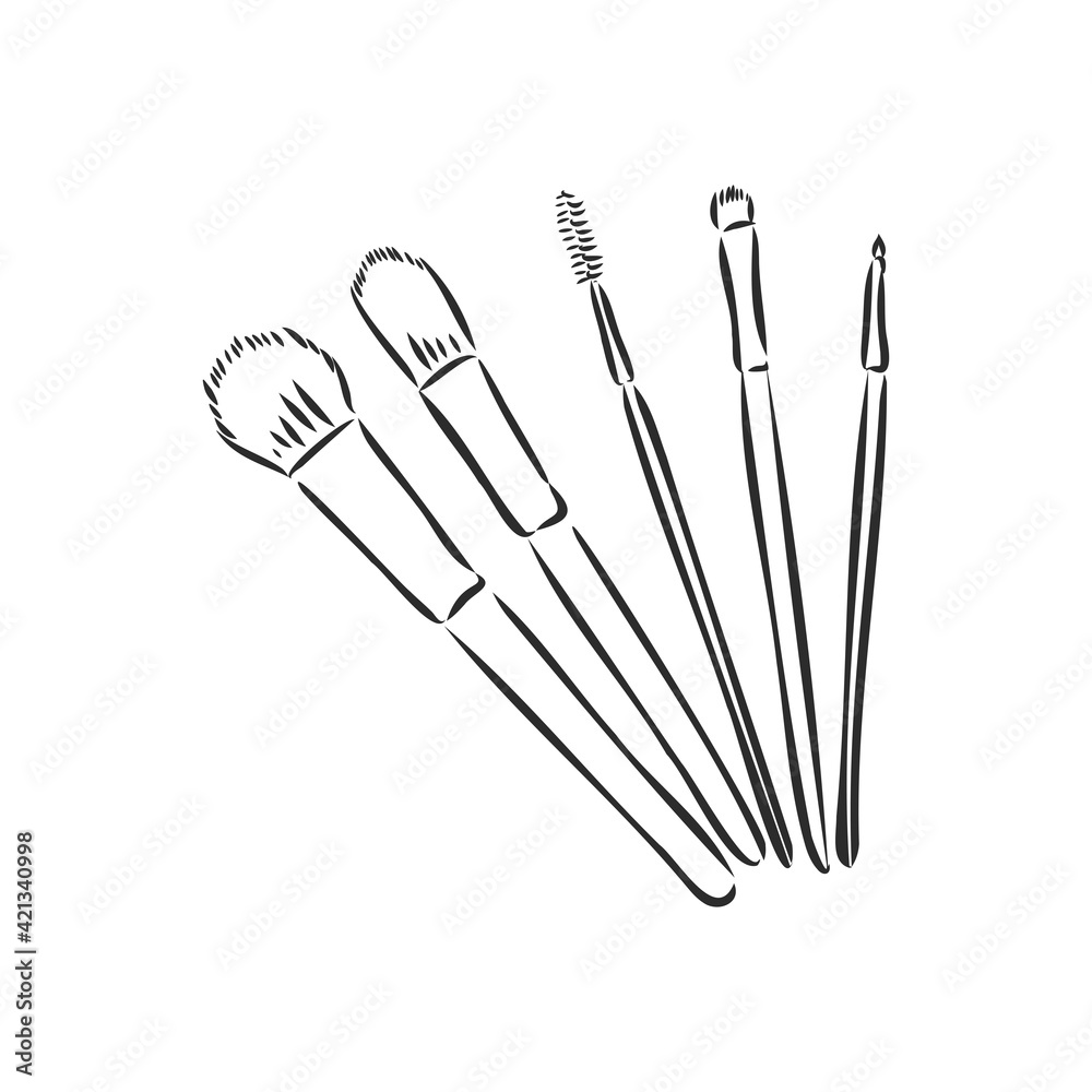 Make up brushes on the beige background for beauty salon.