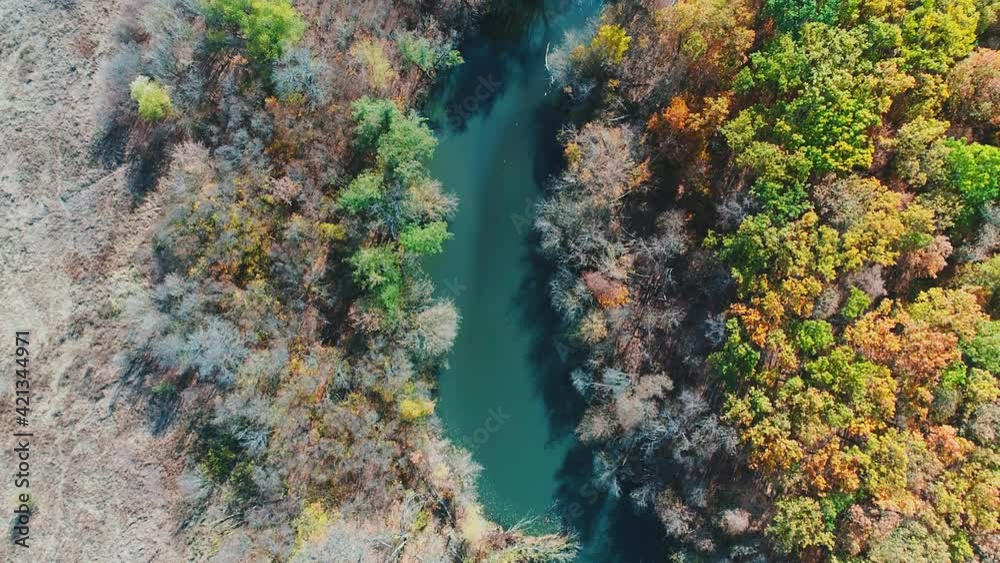 Drone flying over the autumn forest. Vibrant natural background of colorful forest. Forest with red and yellow trees aerial top view. Aerial top view of autumn trees in forest background. Drone flying over the autumn forest. Vibrant natural background of colorful forest. Forest with red and yellow trees aerial top view. Aerial top view of autumn trees in forest background.