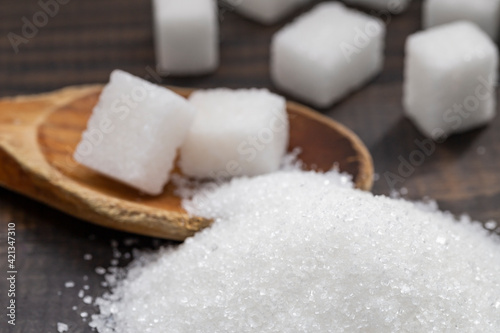 White, crystalline granulated sugar and white cube sugar.  Sugar is a harmful food to the body. Excessive consumption reveals diabetes and accelerates weight gain. 