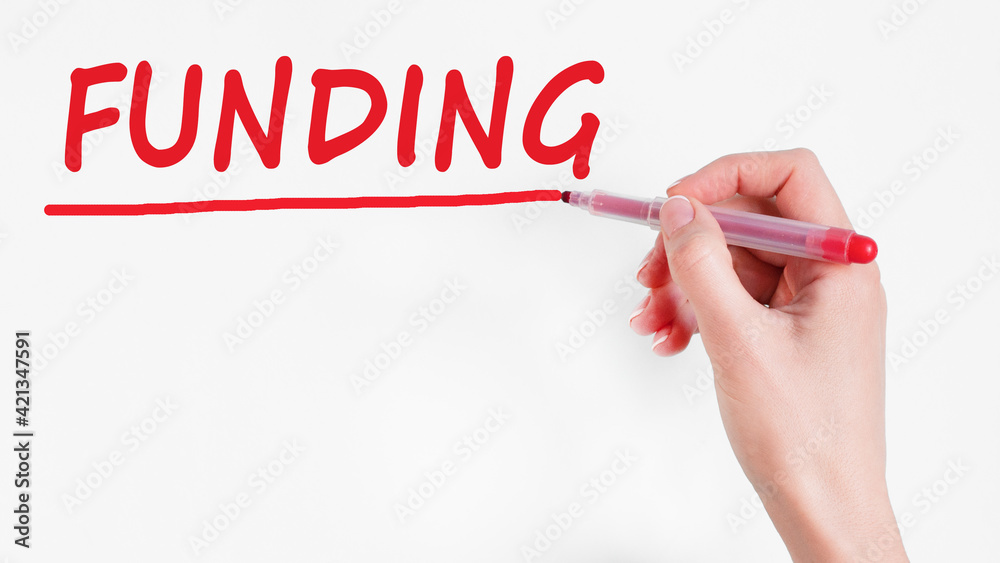 hand writing inscription funding with marker, concept, stock image hand writing inscription funding with marker, concept, stock image