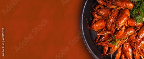A pile of tasty boiled crawfish. Boiled red crayfish or crawfish with  herbs. Crayfish party, restaurant, cafe, pub menu.