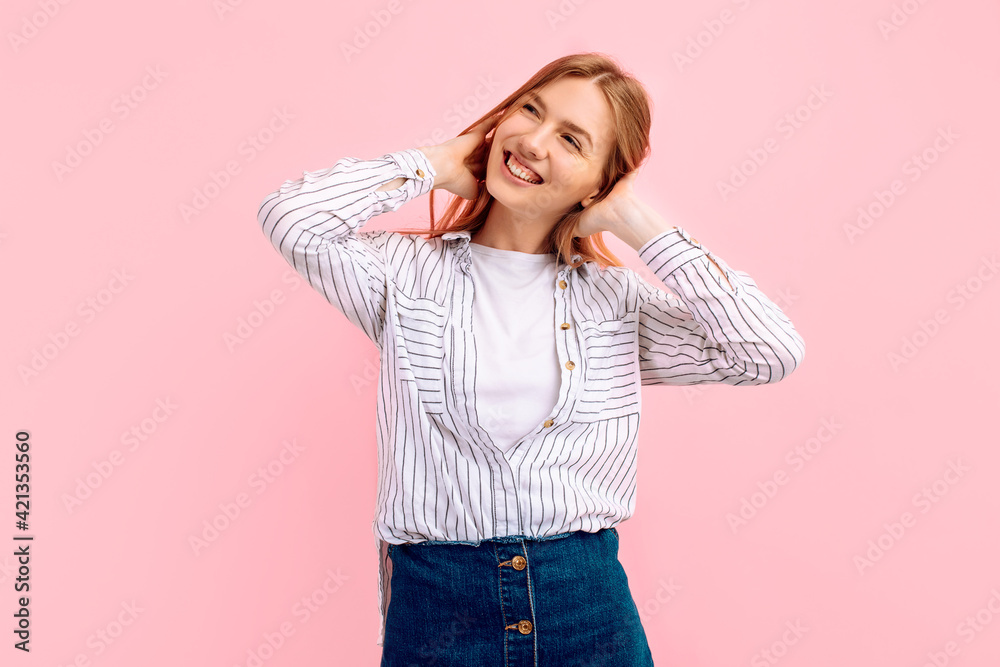Young woman thinking about idea looking up over pink background Young woman thinking about idea looking up over pink background