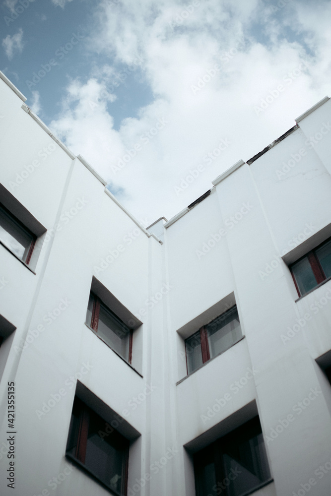 corner of the white facade of a Soviet constructivist building corner of the white facade of a Soviet constructivist building