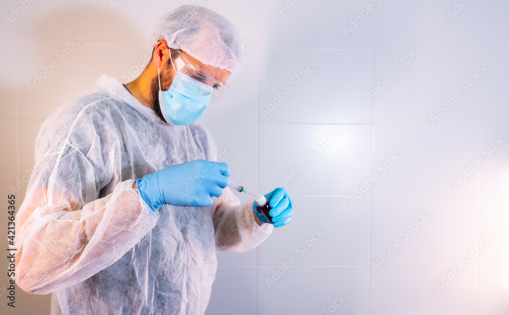 Doctor preparing the new approved coronavirus vaccine. Antibodies, they immunize the population. side effects, risk people, antibodies, covid-19 Doctor preparing the new approved coronavirus vaccine. Antibodies, they immunize the population. side effects, risk people, antibodies, covid-19