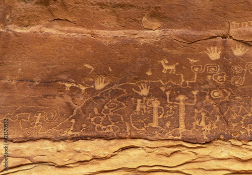 Petroglyph pecked in rock face by Pueblo native american people along petroglyph point trail, Mesa Verde national park, Colorado, United States of America (USA).