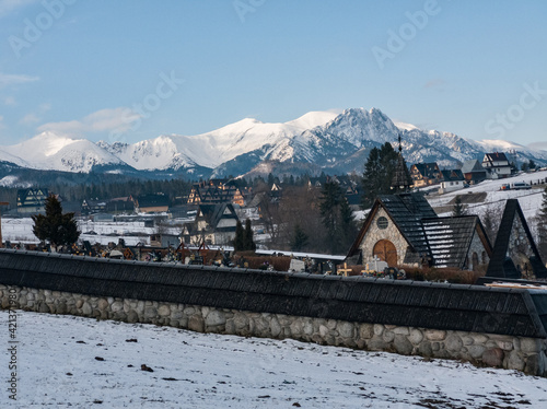  Cemetery in Murzasichle City with view at Tatra Mountains photo