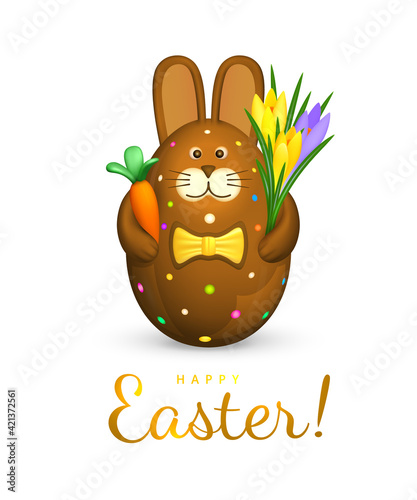 Happy Easter greeting card. Easter egg in the shape of a cute chocolate bunny. Brown rabbit figurine is decorated with sweet sprinkles. Hare is holding a carrot and a bouquet of crocuses