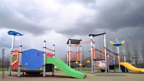 Empty colorful children playground during the covid-19 lockdown restrictions 