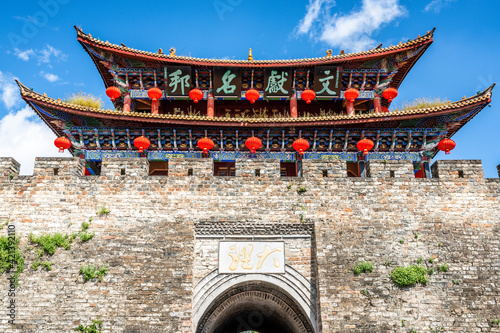 Dali old town south gate tower over blue sky in Yunnan China