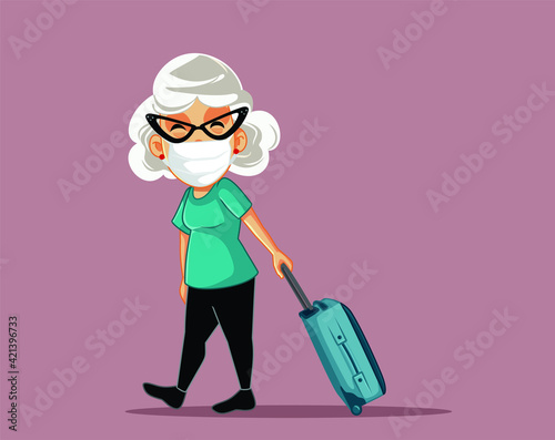 Senior Woman Wearing a Mask Traveling with Luggage