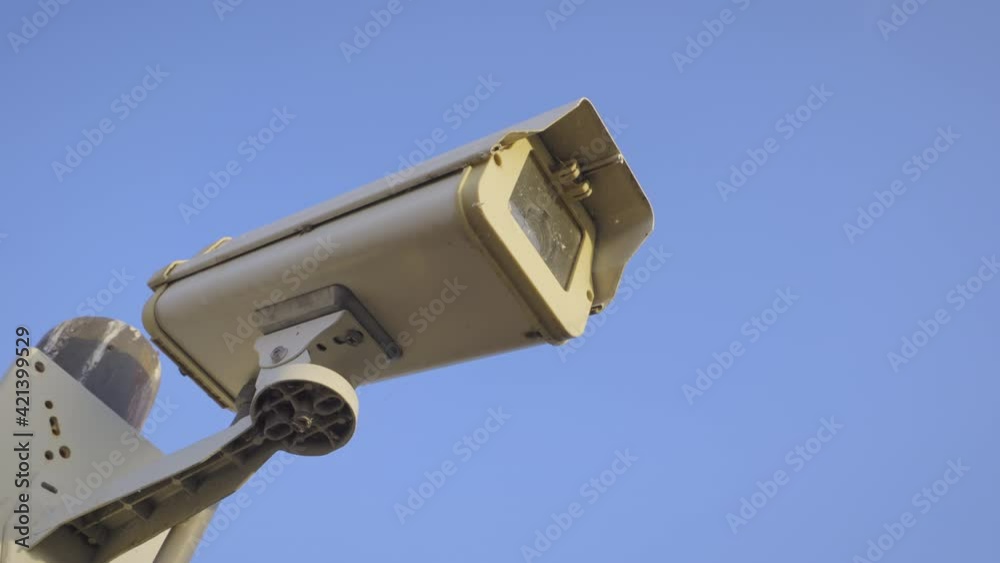 Security camera cctv video surveillance mounted on extremity steel pole and clear blue sky background, Old cctv cameras on to the top pillar on sunny day, Electronic camera monitor record,
handheld. Security camera cctv video surveillance mounted on extremity steel pole and clear blue sky background, Old cctv cameras on to the top pillar on sunny day, Electronic camera monitor record,
handheld.