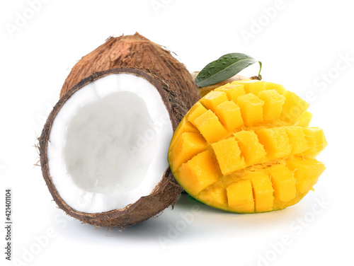 Obraz na płótnie Tasty mango and coconuts on white background