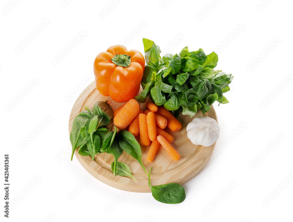 Cutting board with vegetables on white background Cutting board with vegetables on white background
