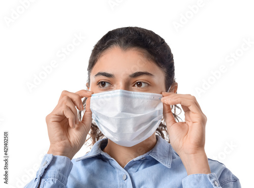 Young woman wearing medical...