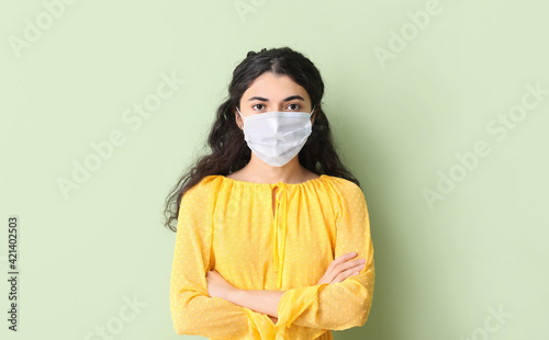 Young woman wearing medical...