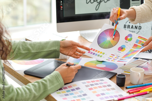 Graphic designer with colle...