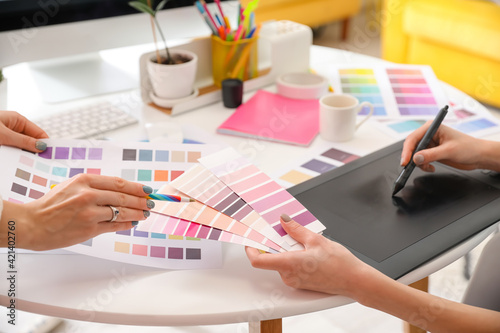Graphic designer with colle...
