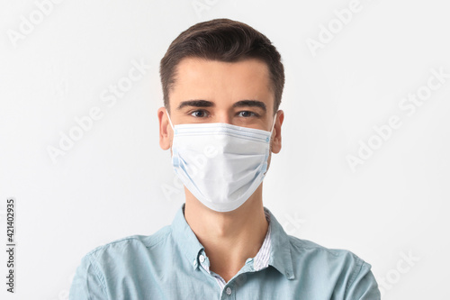 Young man wearing medical m...