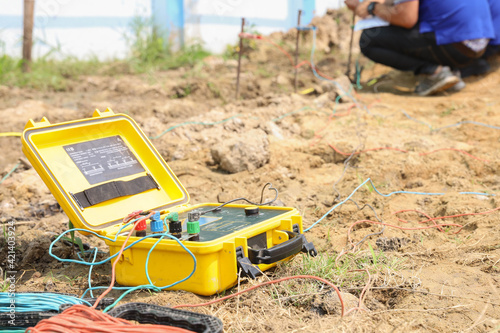 Engineers use earth resistance tester In Electricity  substation