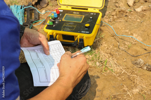 Engineers use earth resistivity testers. To test in a substation
