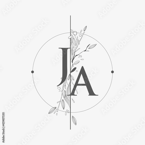 Letter JA Initial Logo with Hand Draw Floral, Initial Wedding Font Logo with Circle and Flowers. photo