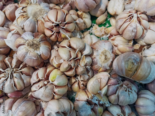 lots of garlic at the market stall