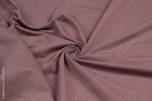 Multicolored fabrics folded top view . Multi-colored textile
