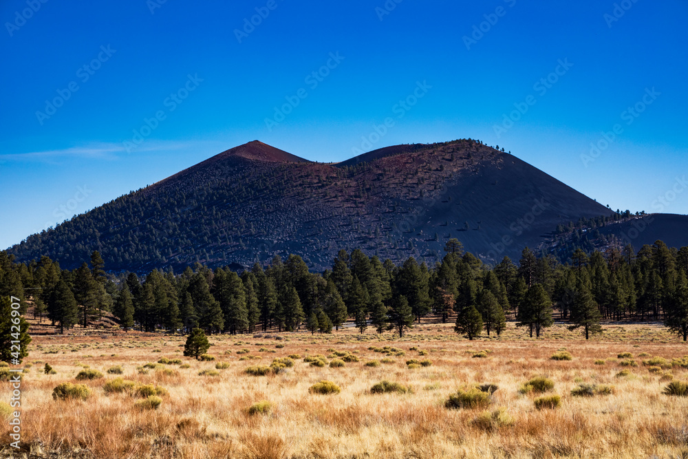 The Sunset Crater Volcano National Monument in Arizona. Sunset Crater is a cinder cone volcano.