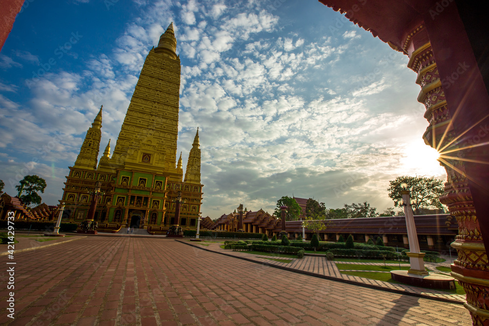 Obraz premium The beautiful sculpture background of, Wat Bang Thong, surrounded by trees, has a large area, is a religious tourist attraction in Krabi, with tourists always visiting, Thailand
